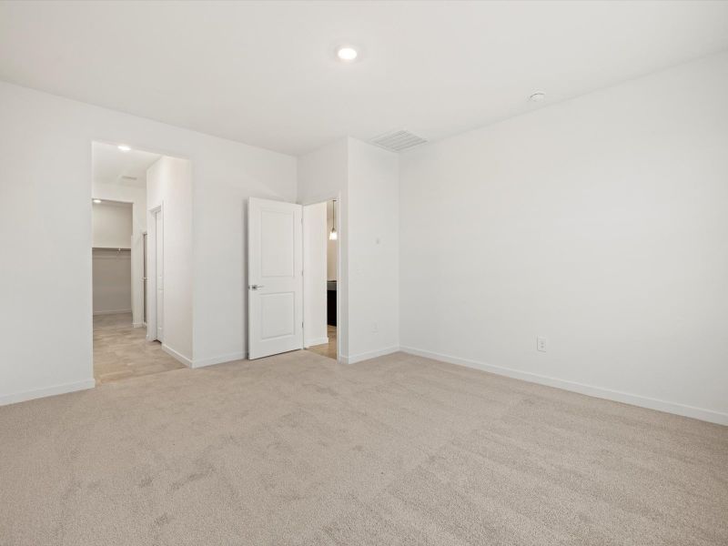 Spacious, unfurnished interior of a new home in Rancho Mirage Estate Series, Maricopa (Image 12).