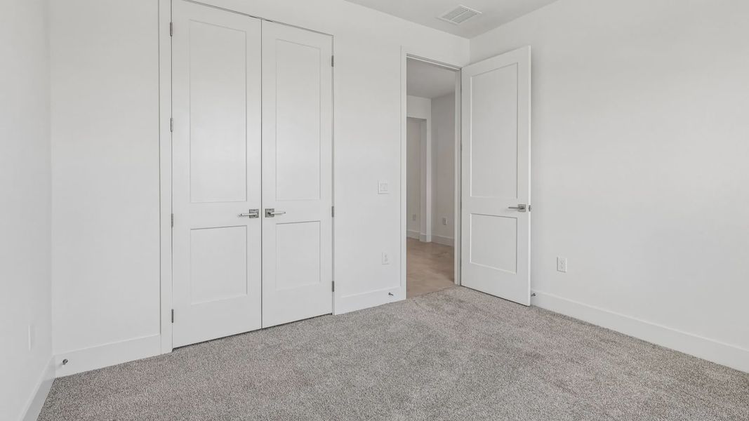 Furnished interior view inside a new home in Ardisia Park, New Smyrna Beach (Image 14).