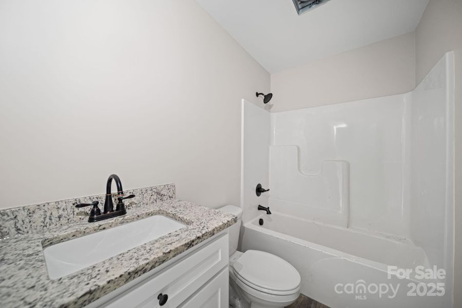 Furnished interior view inside a new home in , Statesville (Image 5).