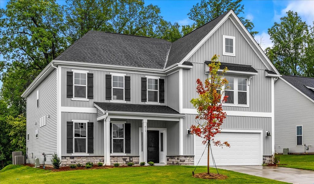 Front exterior of a new home in Fieldstone, Lexington, NC, highlighting curb appeal (Image 2). Front exterior of a new home in Fieldstone, Lexington, NC, highlighting curb appeal (Image 2).
