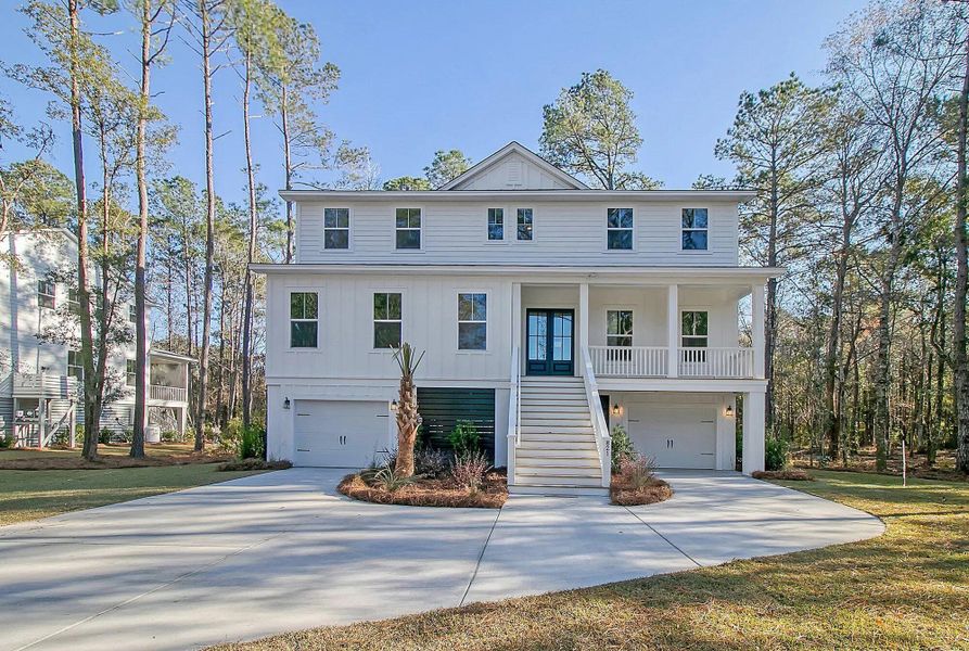Front exterior of a new home in , Edisto Island, SC, highlighting curb appeal (Image 13).
