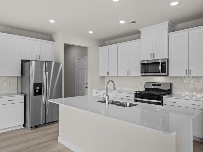 Furnished interior view inside a new home in Chatham Forest, Duncan (Image 5).