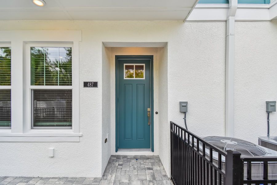 Exterior details and patio area of a home in Towns at Union, St. Petersburg (Image 3).
