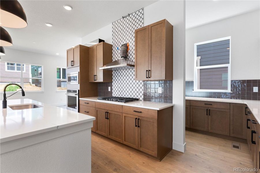 Furnished interior view inside a new home in Dillon Pointe - Journey, Broomfield (Image 4).
