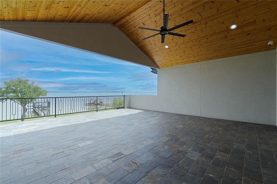 View of second floor patio / terrace with ceiling fan and a balcony View of second floor patio / terrace with ceiling fan and a balcony