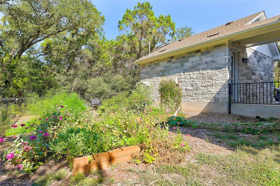 Flower & Vegetable Garden Breeze way to garage