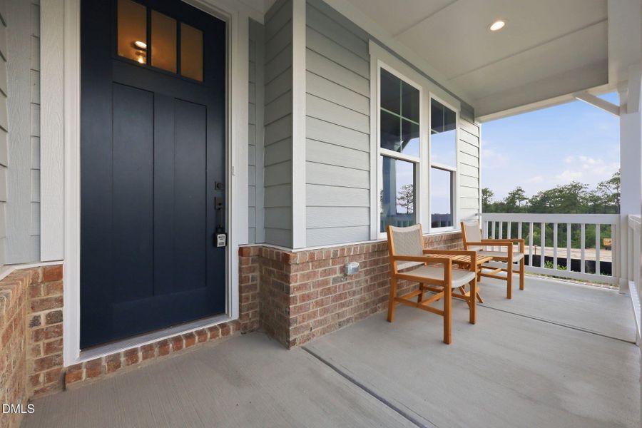 Exterior details and patio area of a home in Addison West, Holly Springs (Image 2). Exterior details and patio area of a home in Addison West, Holly Springs (Image 2).