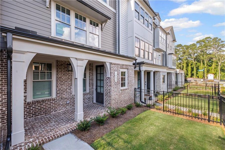 Exterior details and patio area of a home in Devin's Shire - A Kennesaw Tradition, Kennesaw (Image 3).