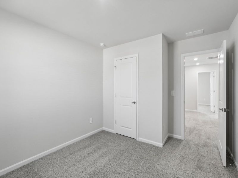 Secondary bedroom in the Chatham floorplan at 250 White Birch Lane in Angier, NC.