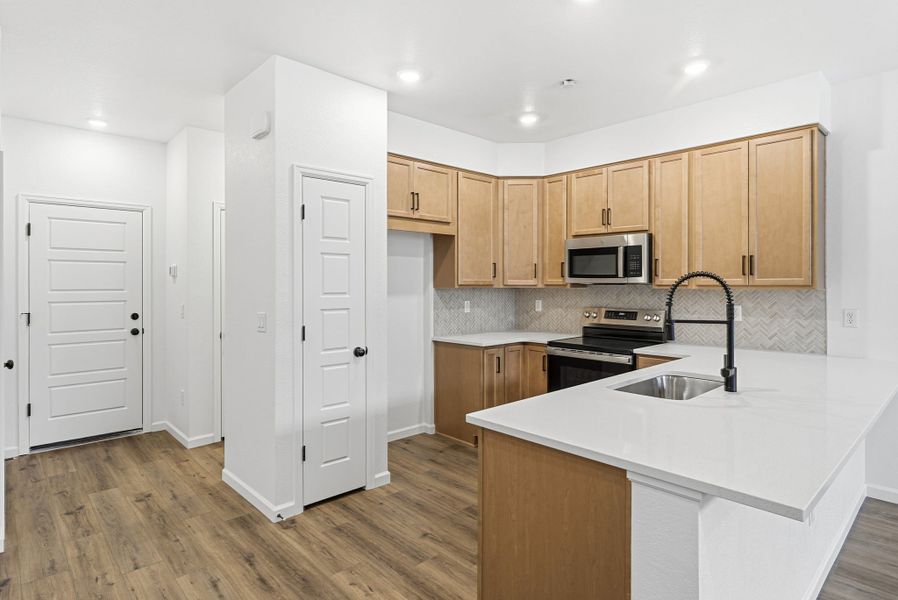 Furnished interior view inside a new home in Trailstone Townhomes - The Westerly Collection, Arvada (Image 4).