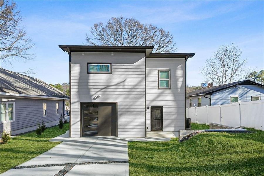 Front exterior of a new home in , Atlanta, GA, highlighting curb appeal (Image 1). Front exterior of a new home in , Atlanta, GA, highlighting curb appeal (Image 1).