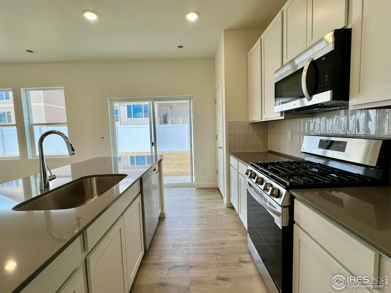 Furnished interior view inside a new home in Union Colony West, Greeley (Image 7).