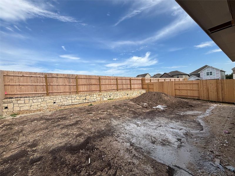 Front exterior of a new home in Covered Bridge, Hutto, TX, highlighting curb appeal (Image 2). Front exterior of a new home in Covered Bridge, Hutto, TX, highlighting curb appeal (Image 2).