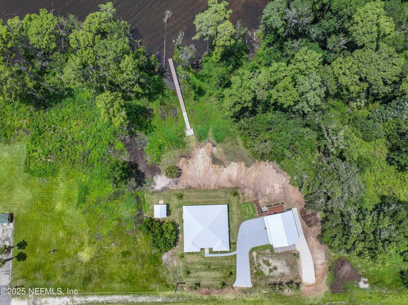 Front exterior of a new home in , East Palatka, FL, highlighting curb appeal (Image 49). Front exterior of a new home in , East Palatka, FL, highlighting curb appeal (Image 49).
