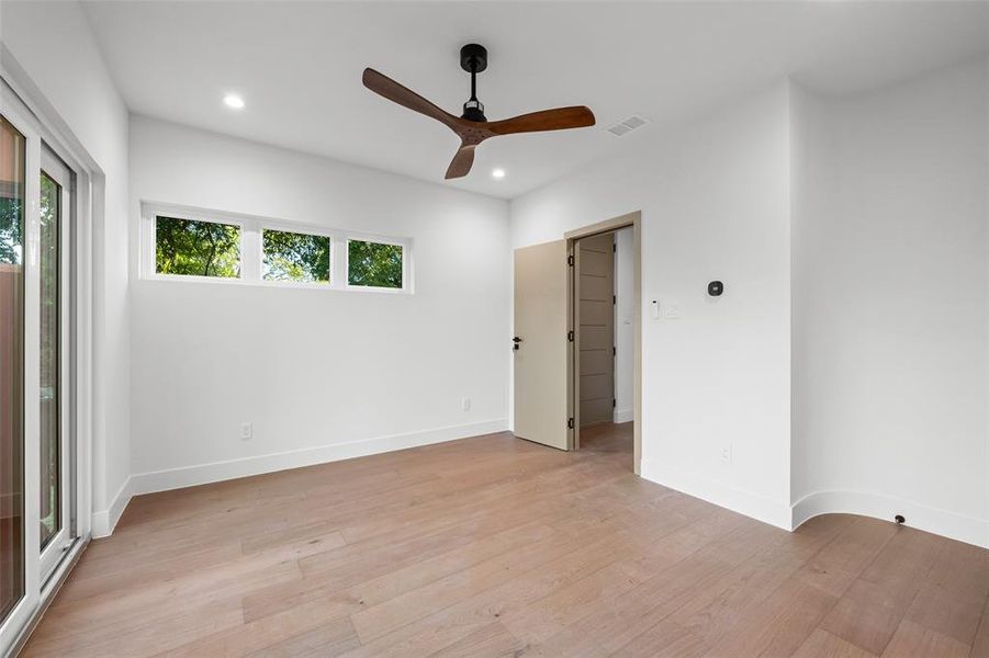 Unfurnished room with light wood-style flooring, recessed lighting, and ceiling fan
