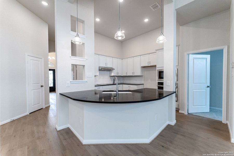 Furnished interior view inside a new home in The Woodlands at Medina Hills, Mico (Image 2).