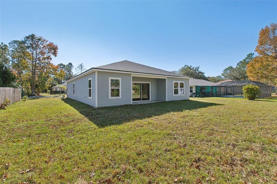 Exterior details and patio area of a home in Palm Coast, Palm Coast (Image 3).