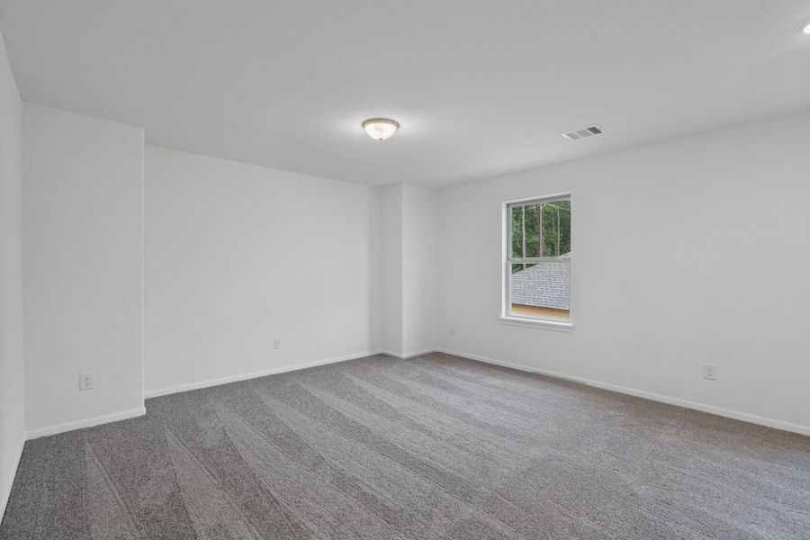 Your secondary bedroom features plush carpet, fresh paint, closet, and a large window that lets in plenty of natural lighting. Your secondary bedroom features plush carpet, fresh paint, closet, and a large window that lets in plenty of natural lighting.