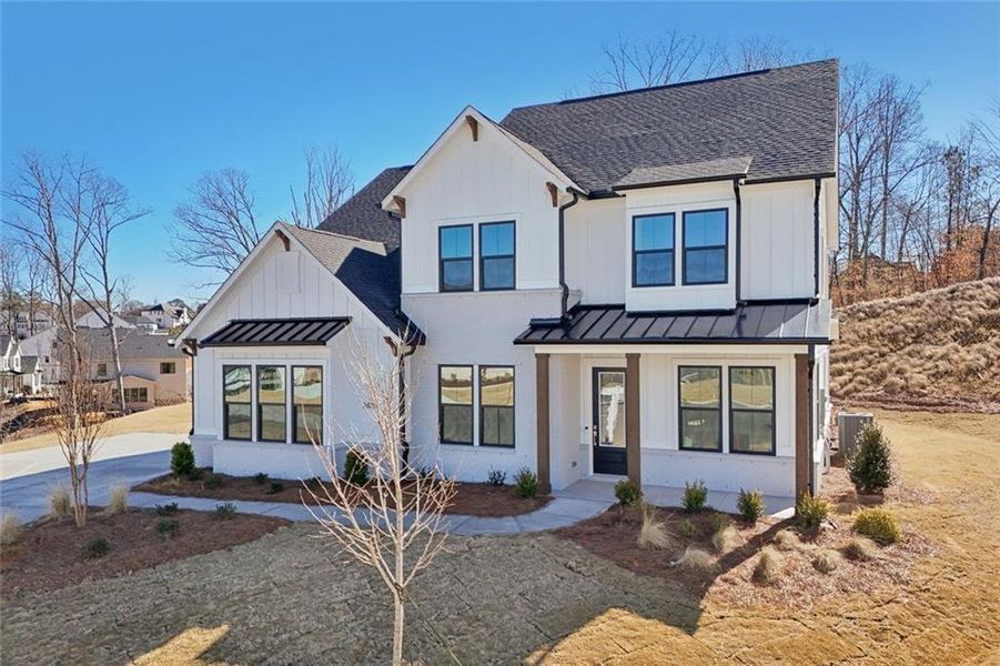 Front exterior of a new home in Sterling Pointe, Cumming, GA, highlighting curb appeal (Image 30).