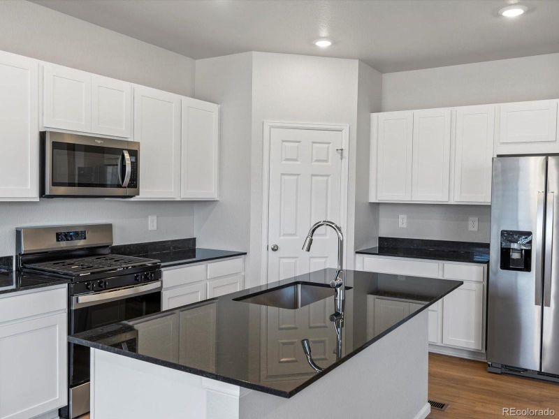 Furnished interior view inside a new home in Lake Bluff, Greeley (Image 10).