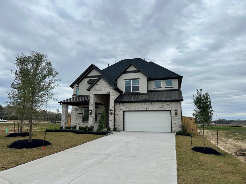 Front exterior of a new home in Briarley, Montgomery, TX, highlighting curb appeal (Image 25).