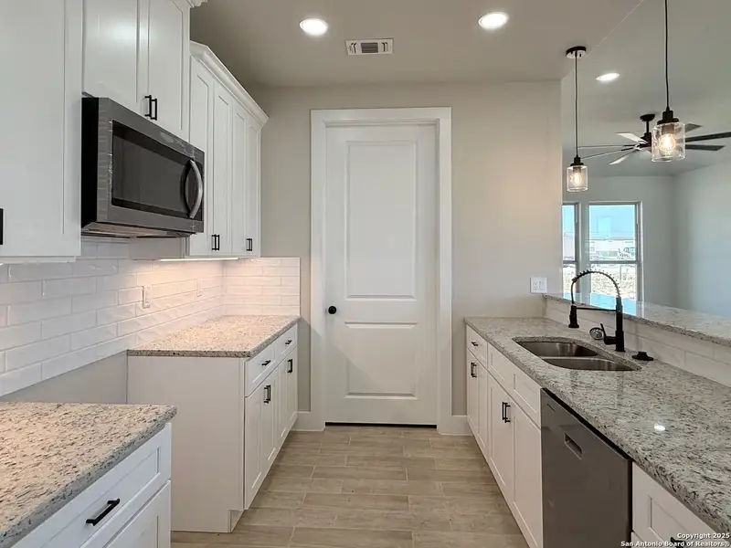 Furnished interior view inside a new home in , La Vernia (Image 4). Furnished interior view inside a new home in , La Vernia (Image 4).