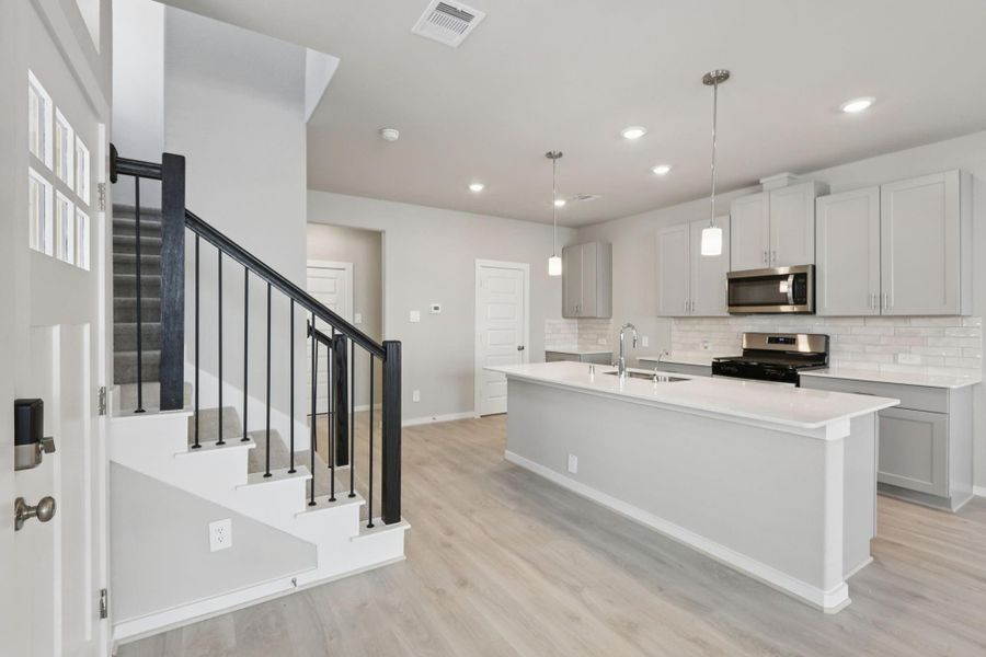 Furnished interior view inside a new home in Kemah Crossing - City Series, Kemah (Image 9). Furnished interior view inside a new home in Kemah Crossing - City Series, Kemah (Image 9).