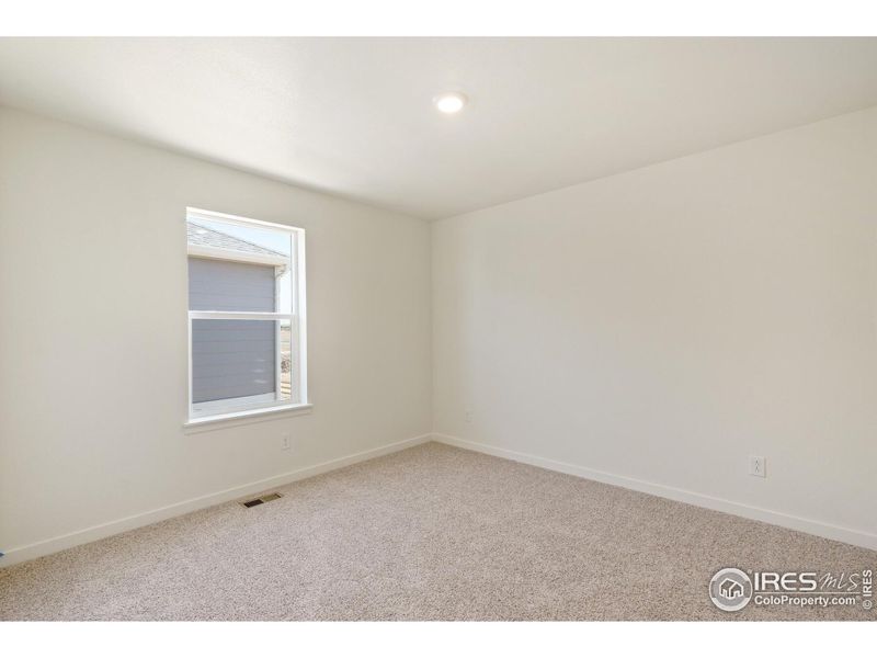 Spacious, unfurnished interior of a new home in Westgate, Greeley (Image 27).