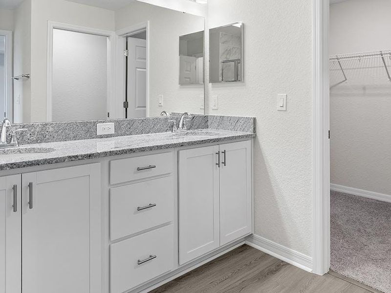 Your suite is complete with a walk-in wardrobe and en-suite bath.