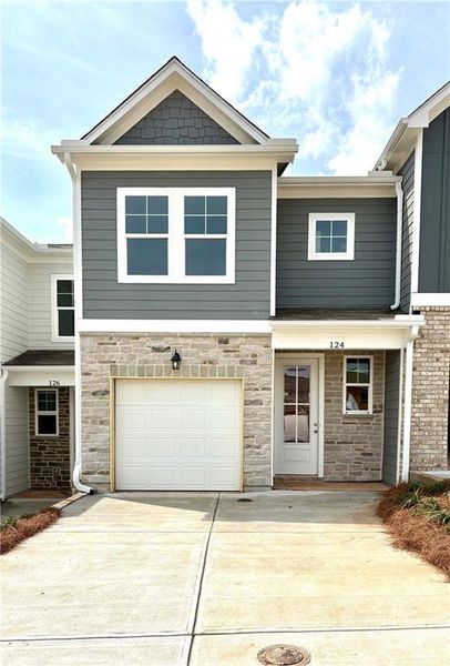 Front exterior of a new home in Stegall Village, Cartersville, GA, highlighting curb appeal (Image 77). Front exterior of a new home in Stegall Village, Cartersville, GA, highlighting curb appeal (Image 77).