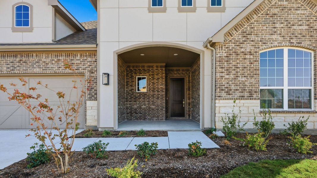 Exterior details and patio area of a home in Rio Vista at Kelly Ranch, Aledo (Image 3).