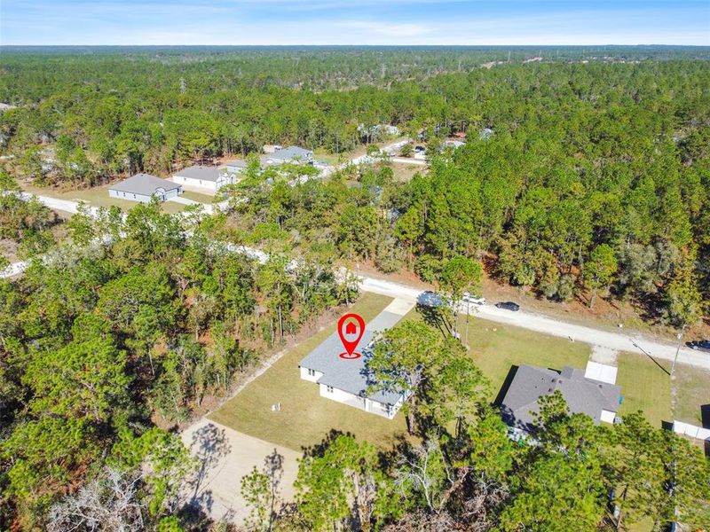 Front exterior of a new home in , Weeki Wachee, FL, highlighting curb appeal (Image 30). Front exterior of a new home in , Weeki Wachee, FL, highlighting curb appeal (Image 30).