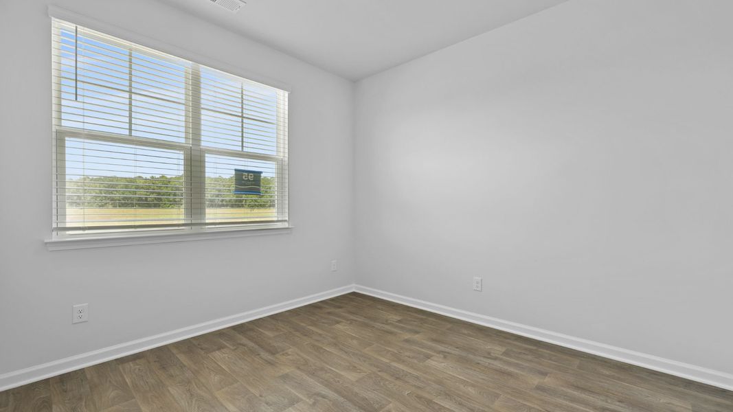 Spacious, unfurnished interior of a new home in Pine Hills at Cane Bay, Summerville (Image 19).