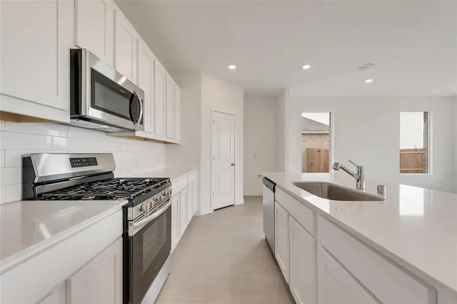 Furnished interior view inside a new home in Reatta Ridge: Classic Collection, Justin (Image 3). Furnished interior view inside a new home in Reatta Ridge: Classic Collection, Justin (Image 3).