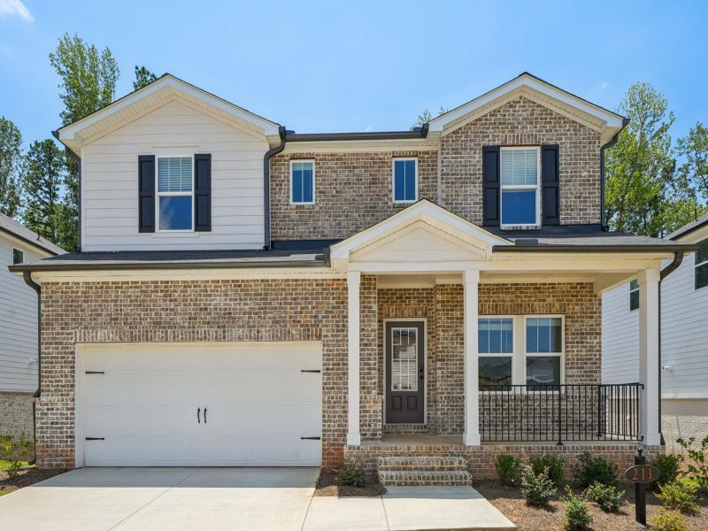 Front exterior of a new home in Martin Springs - Estate Series, Lawrenceville, GA, highlighting curb appeal (Image 1). Front exterior of a new home in Martin Springs - Estate Series, Lawrenceville, GA, highlighting curb appeal (Image 1).