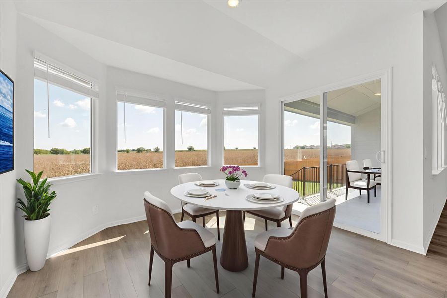 Sunroom with wood finished floors and recessed lighting Sunroom with wood finished floors and recessed lighting
