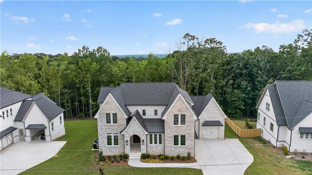 Front exterior of a new home in , Buford, GA, highlighting curb appeal (Image 35).