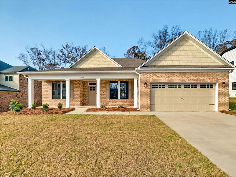 Front exterior of a new home in Collins Cove, Chapin, SC, highlighting curb appeal (Image 2).