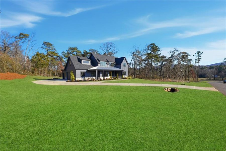 Front exterior of a new home in , Rydal, GA, highlighting curb appeal (Image 30).