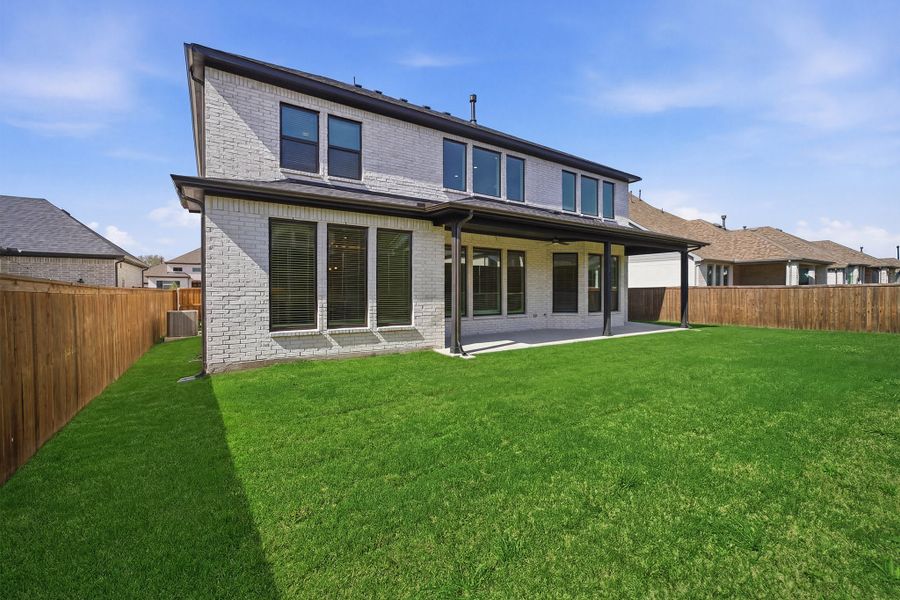 Exterior details and patio area of a home in Sonoma Verde, Rockwall (Image 31).