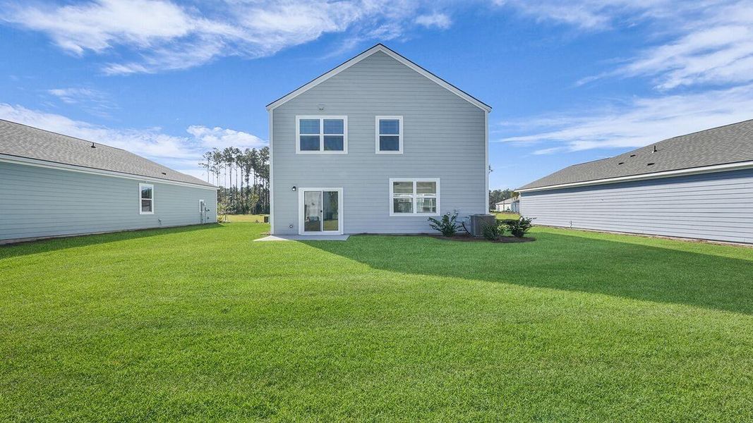 Exterior details and patio area of a home in Hillcrest, Ravenel (Image 19). Exterior details and patio area of a home in Hillcrest, Ravenel (Image 19).