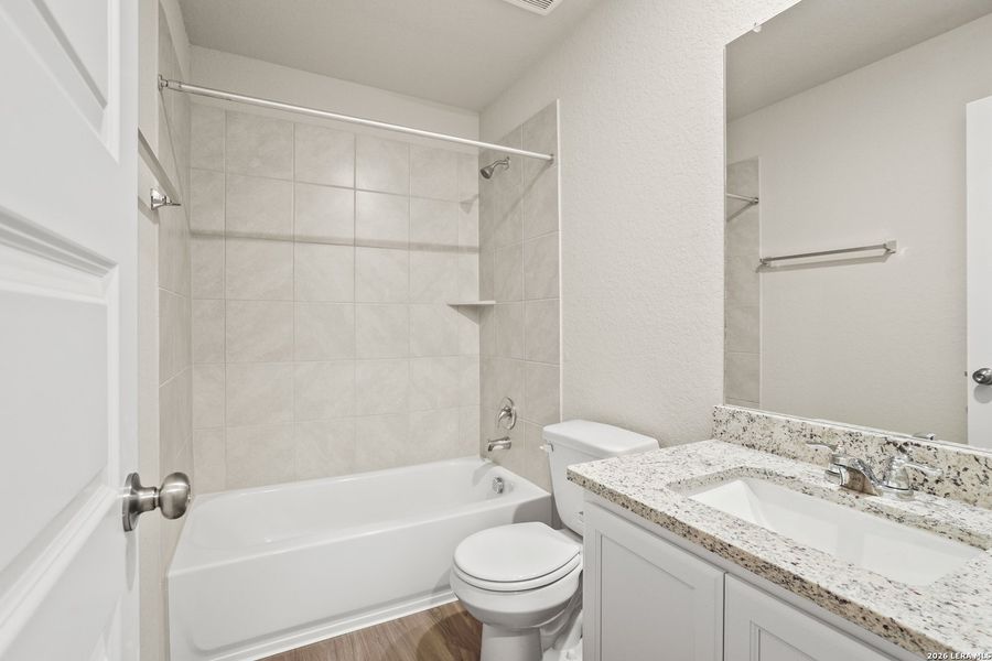 Furnished interior view inside a new home in Hickory Ridge, Elmendorf (Image 9).