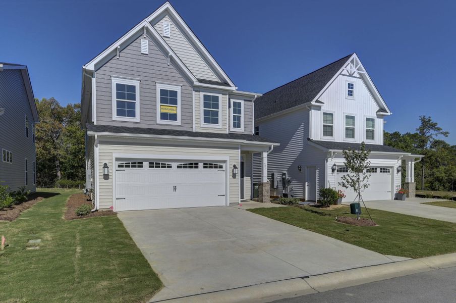Front exterior of a new home in Ashton Lakes, Lexington, SC, highlighting curb appeal (Image 23).