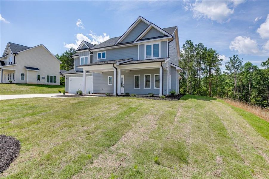 Front exterior of a new home in , Toccoa, GA, highlighting curb appeal (Image 2). Front exterior of a new home in , Toccoa, GA, highlighting curb appeal (Image 2).