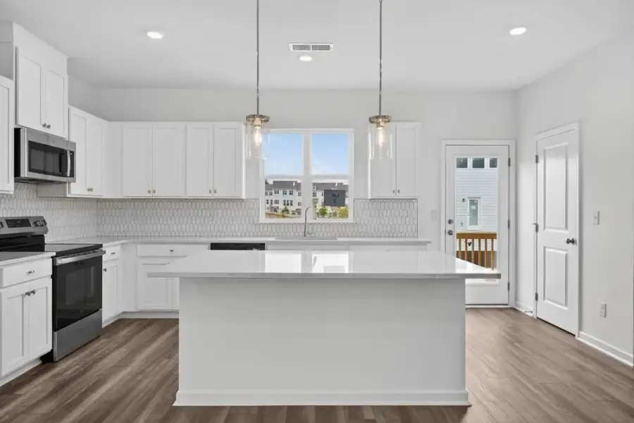 Furnished interior view inside a new home in Chandler Run, Tucker (Image 7).