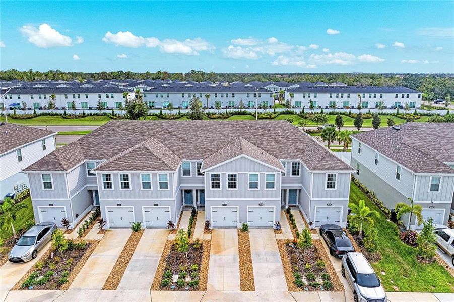Front exterior of a new home in , Bradenton, FL, highlighting curb appeal (Image 20).