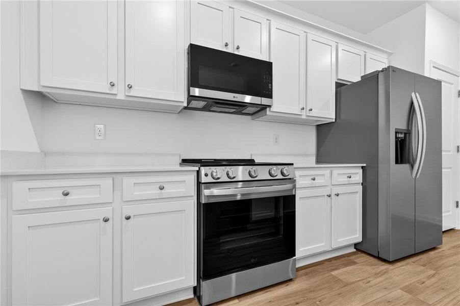 Furnished interior view inside a new home in Lexington Meadows, Athens (Image 11).