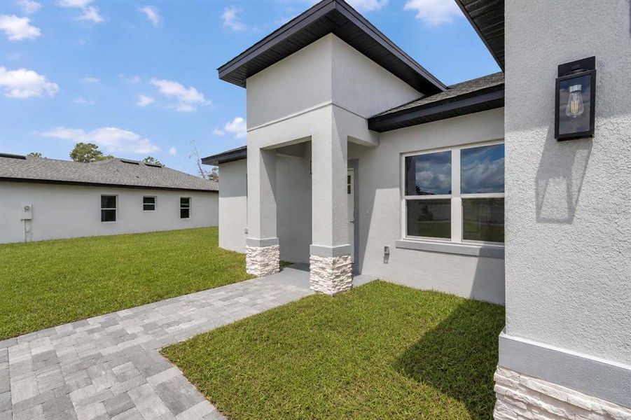 Exterior details and patio area of a home in , Ocala (Image 24).