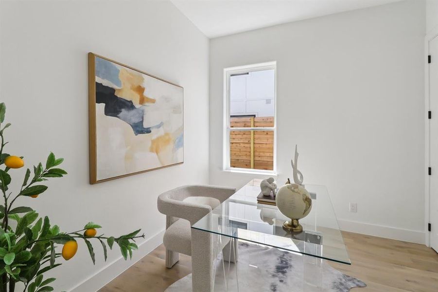 Office area featuring wood finished floors