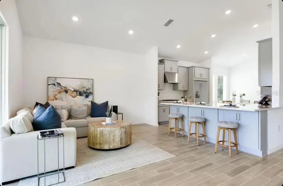 Furnished interior view inside a new home in Ardisia Park, New Smyrna Beach (Image 3).